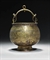 A KHORASSAN COPPER INLAID BRONZE BUCKET  