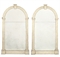 A PAIR OF PAINTED WALL MIRRORS  