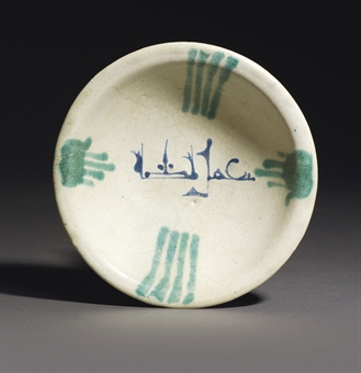 AN ABBASID TIN GLAZED POTTERY BOWL  