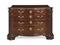 A GEORGE III MAHOGANY SERPENTINE CHEST-OF-DRAWERS  