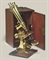 A lacquered brass binocular microscope  
