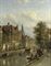 Townsfolk on a quay in Amsterdam with the oude kerk beyond