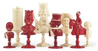 A FRENCH CARVED IVORY  AND BONE BUST CHESS SET  