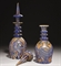 DEUX FLACONS ET LEURS COUVERCLES ASSOCIES  