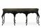 AN EBONISED AND PARCEL-GILT SIDE TABLE  