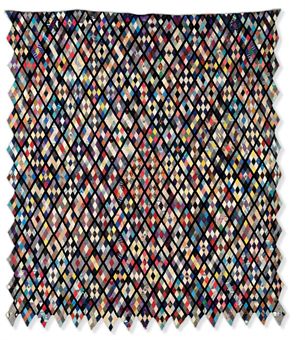 A SILK PATCHWORK QUILT  
