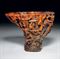 A LARGE RHINOCEROS HORN LIBATION CUP  