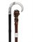 [FREUD, Sigmund (1856-1939)]. Two canes reputedly owned by Freud: the first an ebony walking stick, the Austrian silver handle decorated with scrolling foliate tendrils (lacking metal ferrule), early twentieth century; the second a fruitwood cane, the rootwood knopped terminal with shaped silver mounts, the stem with a silver buckle clasp engraved with interlaced initials SF (lacking ferrule), the silver buckle indistinctly marked TD [perhaps Thomas Davies Junior], Birmingham, 1893. Provenance: Sigmund Freud (by repute; the 'SF' monogram corresponds with artefacts at the Freud Museum in London); Freud's niece (the daughter of his half-brother Philipp), Pauline Hartwig (1873-1951) -- described during her lifetime as having belonged to her uncle; acquired at posthumous sale of her widower, Frederick (d.18 January 1958), at The Bend, Thorley Lane, Timperley, Cheshire, in 1960; by descent to present owners.	 (2)