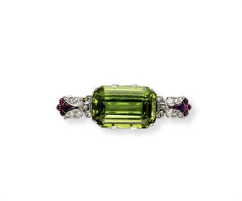 AN ART DECO PERIDOT, AMETHYST, RUBY AND DIAMOND BROOCH  