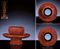 AN EXTREMELY RARE EARLY MING CARVED CINNABAR LACQUER 'DRAGON' BOWLSTAND 