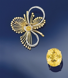 A citrine and diamond brooch and a ring