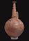 A LARGE CYPRIOT RELIEF-DECORATED RED POLISHED WARE JUG  