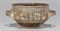 A GREEK POTTERY SKYPHOS  