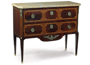 A FRENCH MAHOGANY AND FRUITWOOD COMMODE