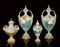 A PAIR OF TWO-HANDLED VASES AND COVERS BY CHARLEY BALDWYN