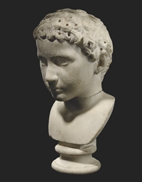 A ROMAN MARBLE PORTRAIT HEAD OF A YOUNG BOY