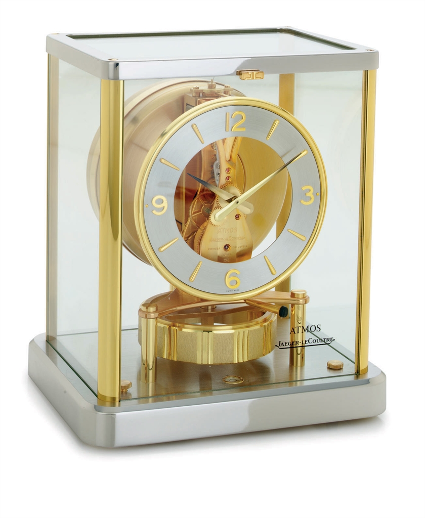 JAEGERLECOULTRE. A GILT AND CHROME ATMOS CLOCK SIGNED JAEGER