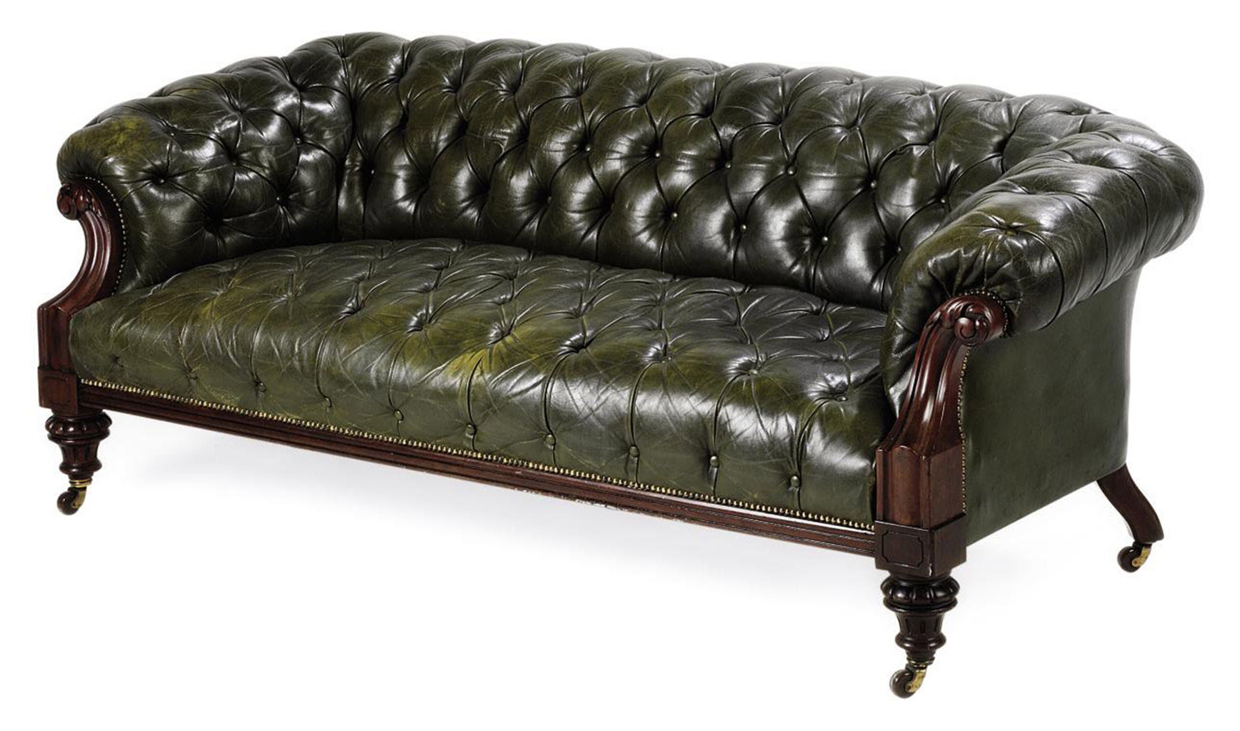 A MIDVICTORIAN CARVED MAHOGANY CHESTERFIELD SOFA THIRD QUARTER 19TH CENTURY Interiors
