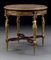 A FRENCH ORMOLU-MOUNTED MAHOGANY CENTER TABLE