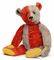 A STEIFF HARLEQUIN TEDDY BEAR, jointed, half red and half blue mohair, one blue and black and one brown and black glass eye, black stitching, yellow felt pads and FF button, circa 1925 --13½in. (34cm.) high (small bald spot below right ear, some fading mainly to the blue, blue eye cracked, patch to right pad and some general wear)