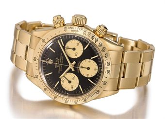 rolex_a_fine_18k_gold_chronograph_wristwatch_with_bracelet_signed_role_d5367654h.jpg