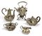 A FOUR-PIECE SILVER TEA SET WITH KETTLE EN SUITE