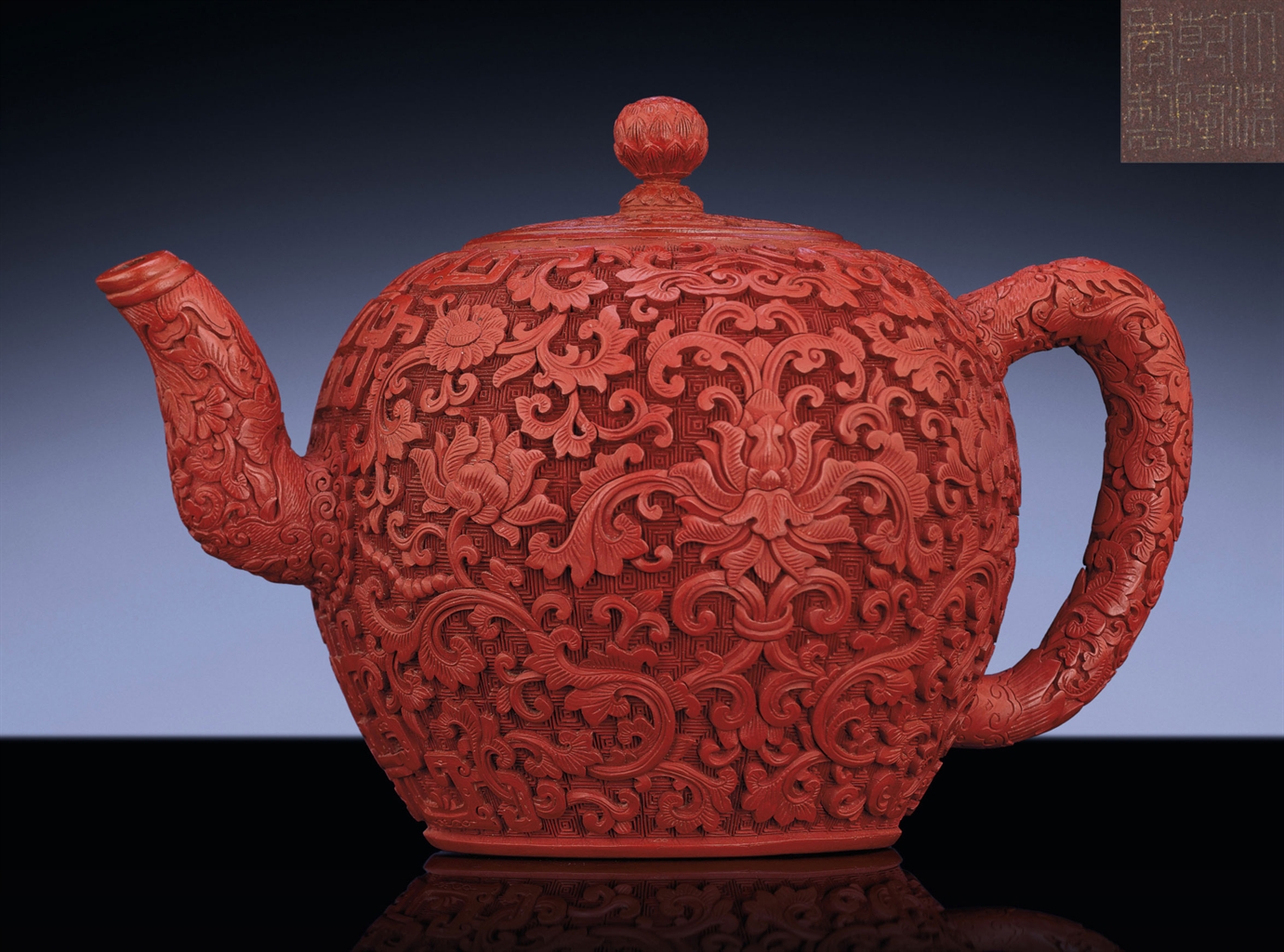 A VERY RARE CINNABAR LACQUERED YIXING TEAPOT QIANLONG INCISED SIX