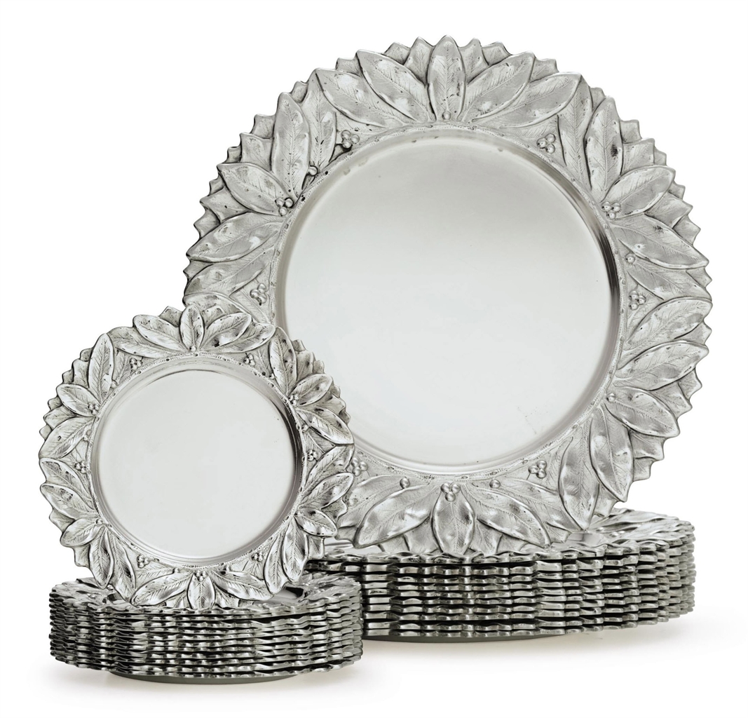 A SET OF ELEVEN SILVER DINNER PLATES AND TWELVE SILVER BREAD PLATES