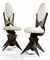 A PAIR OF TOM DIXON WELDED METAL SWIVEL DESK CHAIRS