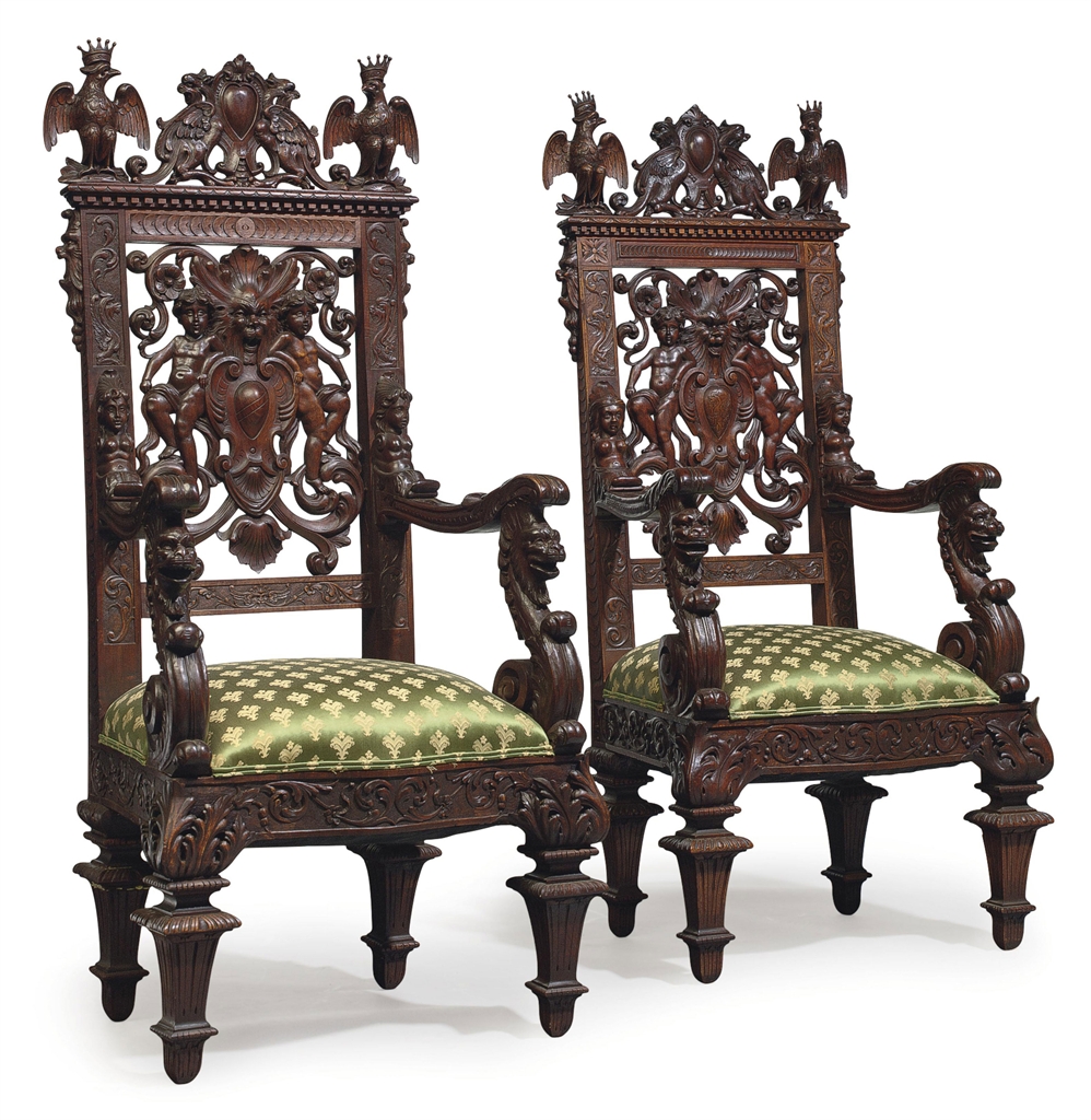 A PAIR OF BAROQUE STYLE CARVED WALNUT ARMCHAIRS POSSIBLY ITALIAN