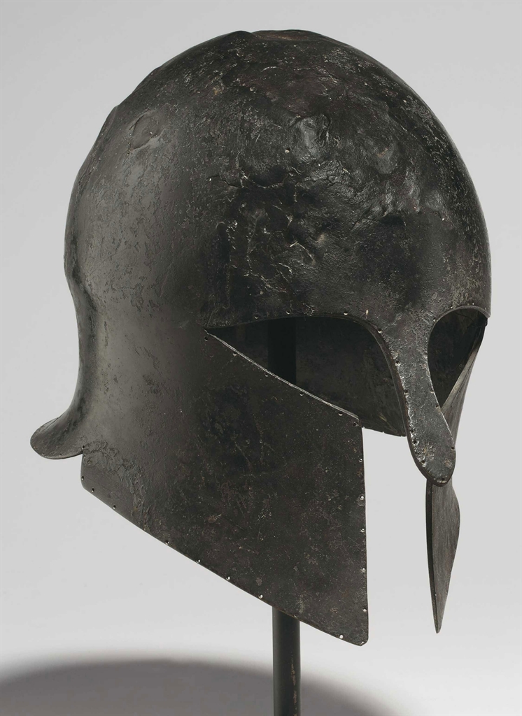 A GREEK BRONZE HELMET OF CORINTHIAN TYPE ARCHAIC PERIOD, CIRCA MID
