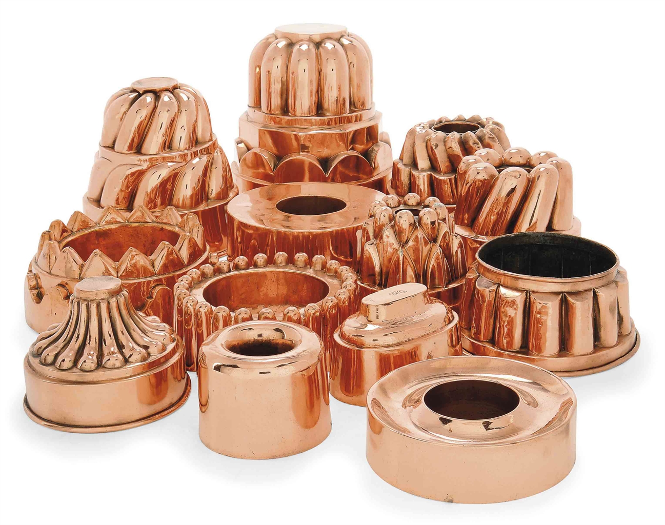 A COLLECTION OF COPPER JELLY MOULDS FRENCH AND ENGLISH, MOST LATE