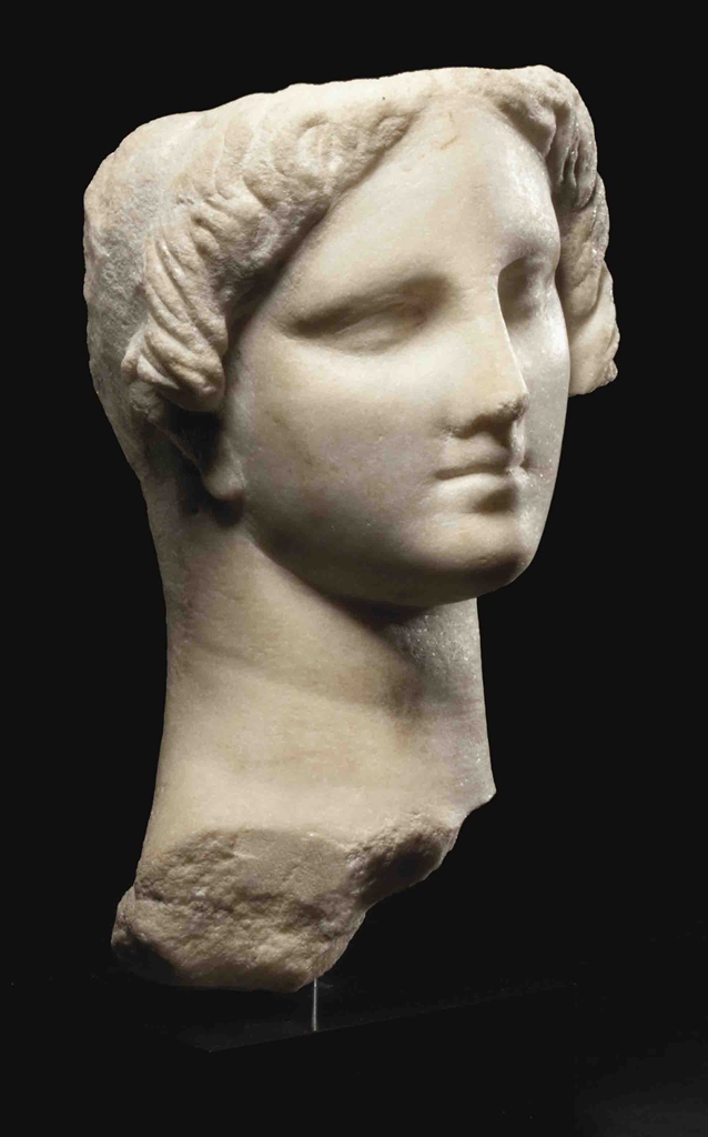 A GREEK MARBLE HEAD OF ISISAPHRODITE HELLENISTIC PERIOD, CIRCA 3RD