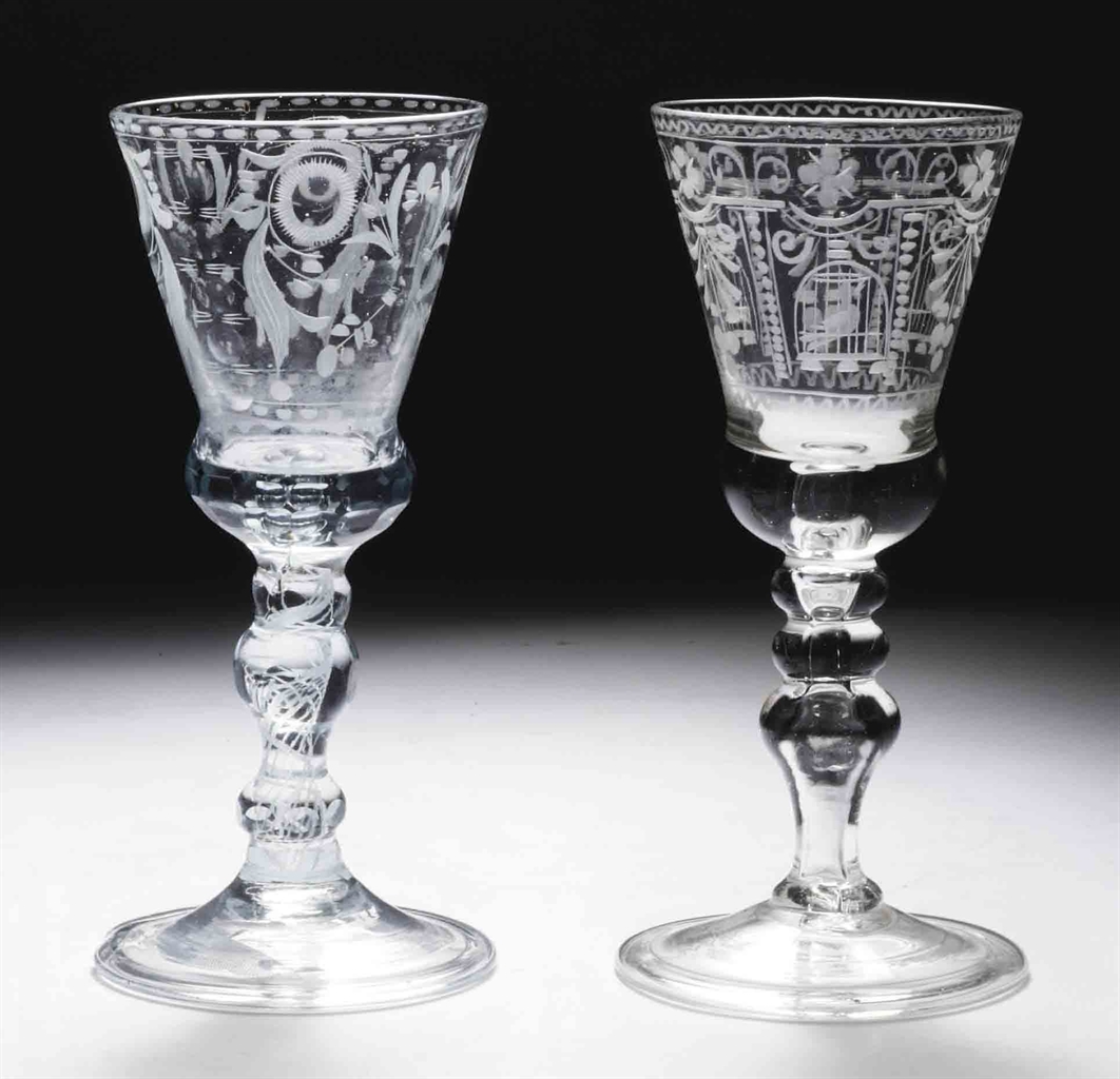Two Dutch engraved glass goblets and a facetted glass goblet 18TH