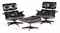 TWO BLACK LAMINATED OAK AND ALUMINUM 'MODEL NO. 670' LOUNGE CHAIRS AND ONE 'MODEL NO.671' OTTOMAN