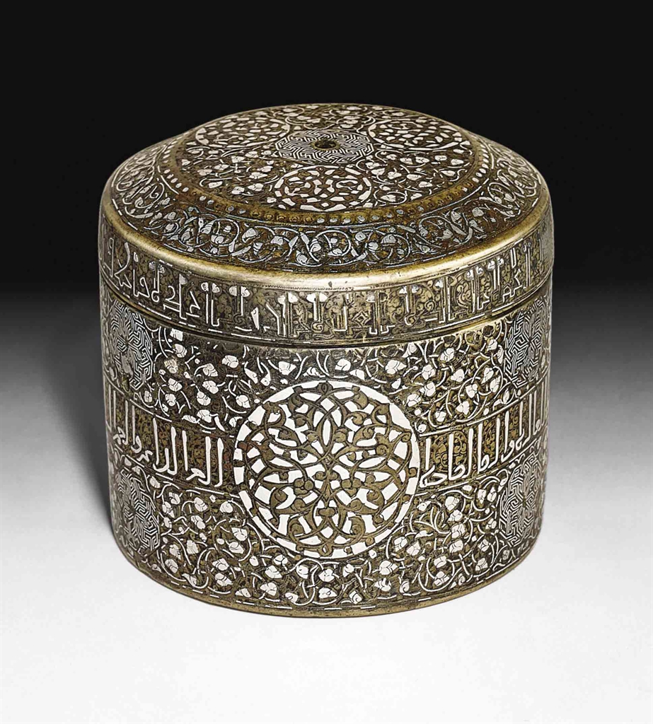 AN IMPORTANT SILVER INLAID BRASS CYLINDRICAL CASKET