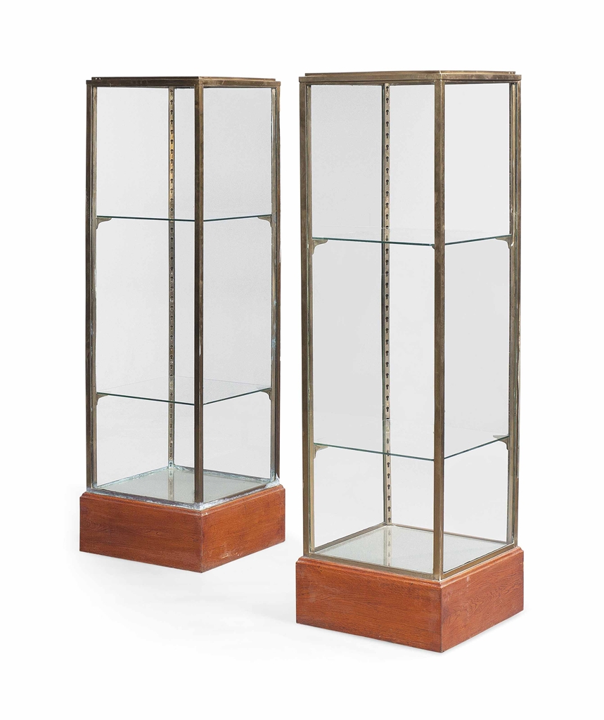 A PAIR OF BRASS AND GLASS DISPLAY MID20TH CENTURY display