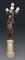 A LIFESIZE FRENCH ORMOLU, GILT AND PATINATED BRONZE FIGURAL TORCHERE OF DIANA, ON MARBLE PEDESTAL