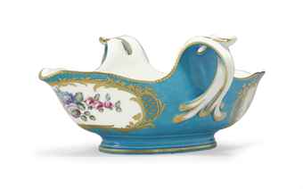 A SEVRES PORCELAIN BLEU CELESTE DOUBLE-LIPPED SAUCEBOAT (SAUCIERE 'A DEUX BECS') 