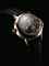 VINCENT BERARD. AN 18K PINK GOLD LEFT-HANDED SEMI-SKELETONISED WRISTWATCH WITH MONTHLY LUNAR CYCLE AND DAY