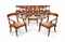 A SET OF EIGHTEEN OAK DINING CHAIRS