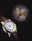 ANDERSEN. A RARE 18K GOLD WRISTWATCH WITH SWEEP CENTRE SECONDS AND CONCEALED EROTIC AUTOMATON