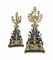 A PAIR OF EMPIRE ORMOLU AND PATINATED BRONZE SEVEN-LIGHT CANDELABRA