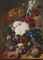 An exuberant flower still life with roses, an orange and red velvet flower and various other flowers in a vase, cherries, plumps, butterflies and a nest with eggs, all on a marble ledge