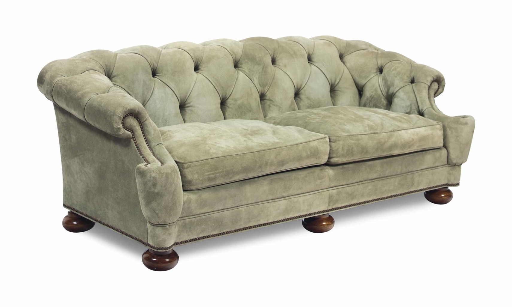 A GREEN SUEDE BUTTONTUFTED SOFA, LATE 20TH CENTURY Interiors