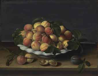 Apricots in a ceramic bowl, with plums on a stone ledge 