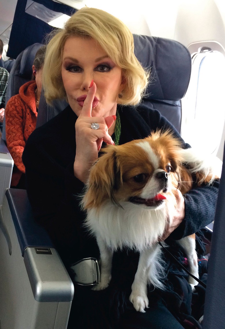 Joan Rivers with Teegan, the Japanese Chin who accompanied her everywhere