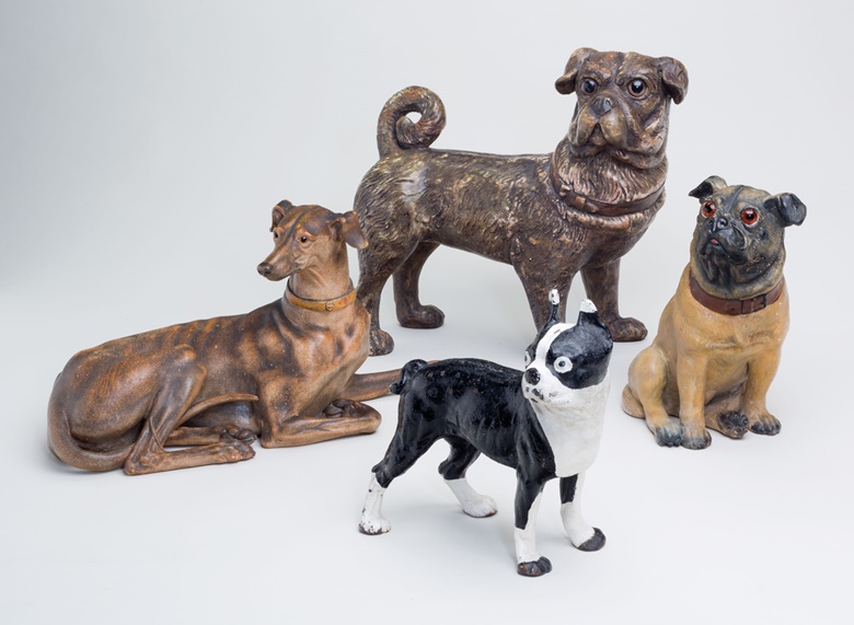 Four English stoneware figures of dogs. Estimate $1,000-1,500. This lot will be offered in The Private Collection of Joan Rivers on 22 June at Christie’s in New York