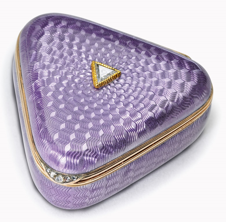 A jewelled gold, silver-gilt and guilloché enamel pill box marked Fabergé, with the workmasters mark of Michael Perchin, St. Petersburg, circa 1890, scratched inventory number 60333. 1¾ in. (4.4 cm.) wide. Estimate $12,000-18,000. This work is offered in The Private Collection of Joan Rivers sale on 22 June at Christie’s New York
