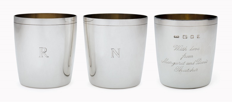 A pair of Elizabeth II silver beakers, a personal gift from Margaret and Denis Thatcher to President and Mrs. Ronald Reagan. Mark of Adrian Gerald Benney, London, 1985 and 1990. Each with gilt interior, inscribed ‘With love from Margaret and Denis Thatcher’ to one side, the reverse each with an initial R or N, marked on rim and to base. Estimate $1,000-2,000. This lot will be offered